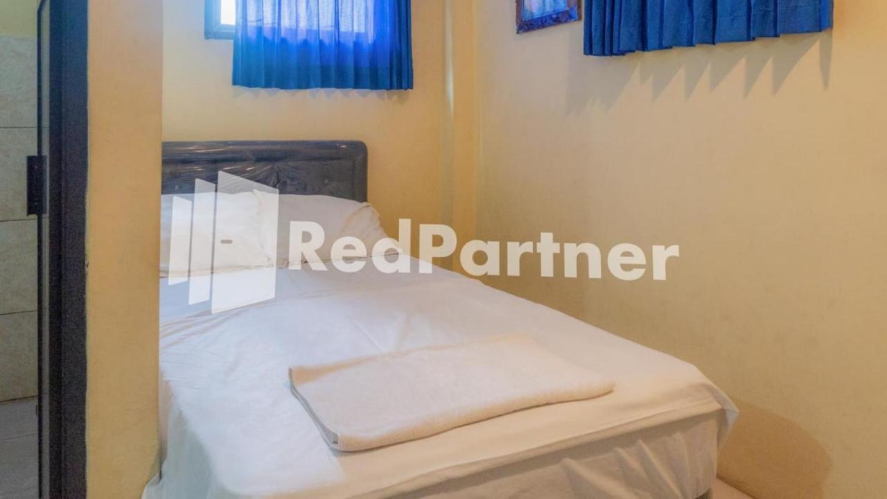 Vandhela Homestay Syariah Mitra Reddoorz Surabaya Exterior foto